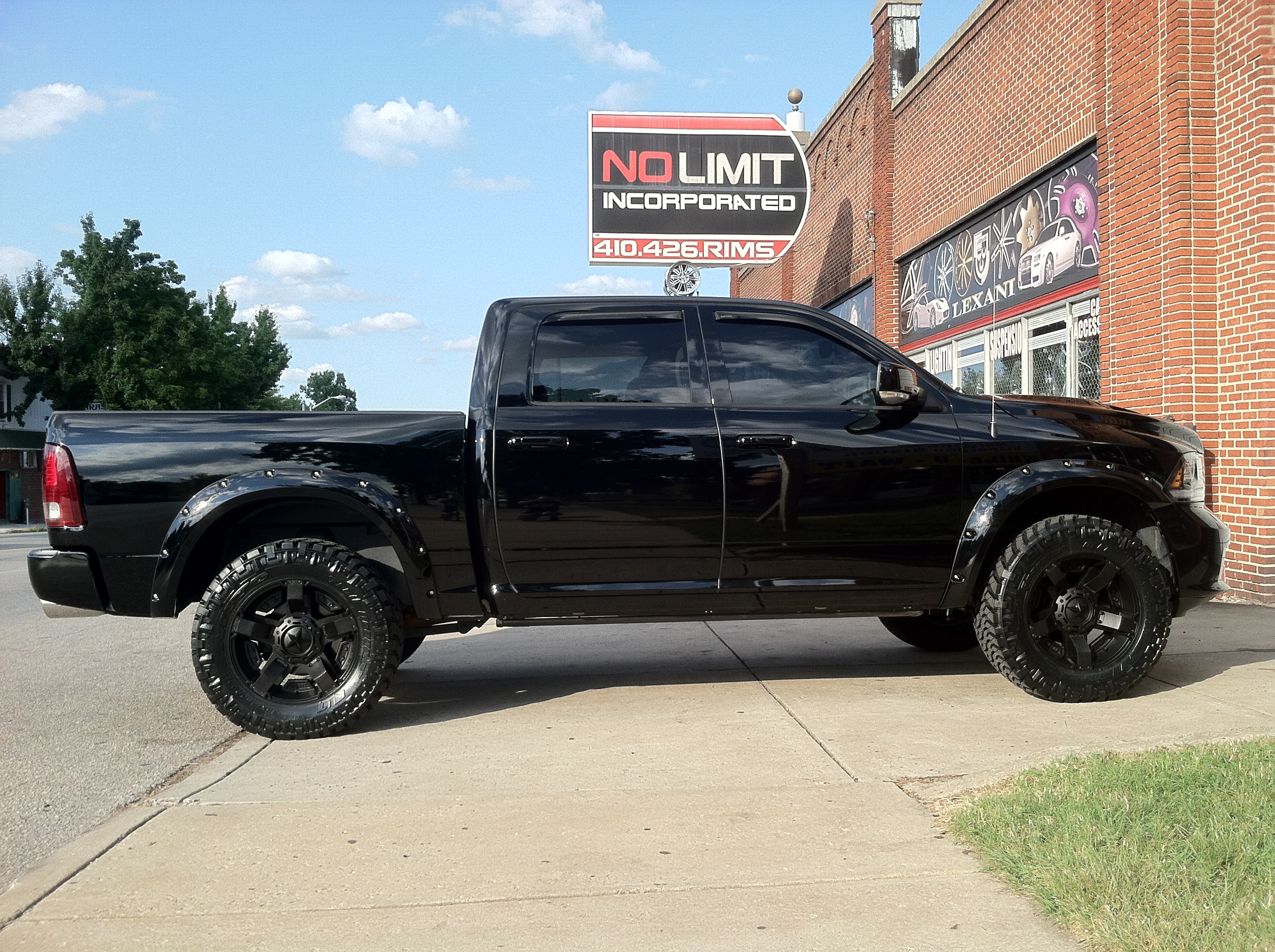 Black dodge ram with rockstar rims